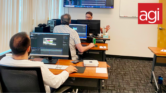 Students in a video editing class at AGI Training.