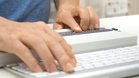 computer with braille display, keyboard